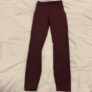 Lululemon leggings, maroon, never worn but no tag.